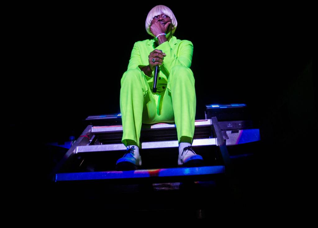 Tyler, The Creator sits and talks to the crowd during his performance at Bumbershoot Music & Arts Festival on Friday, Aug. 30, 2019 in Seattle, Wash. (Olivia Vanni / The Herald)