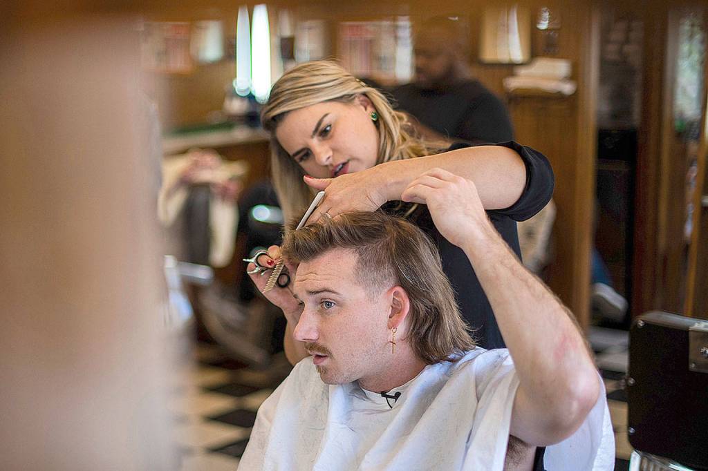 Wallen, 26, receives a mullet at Paul Mole Barber Shop in New York.