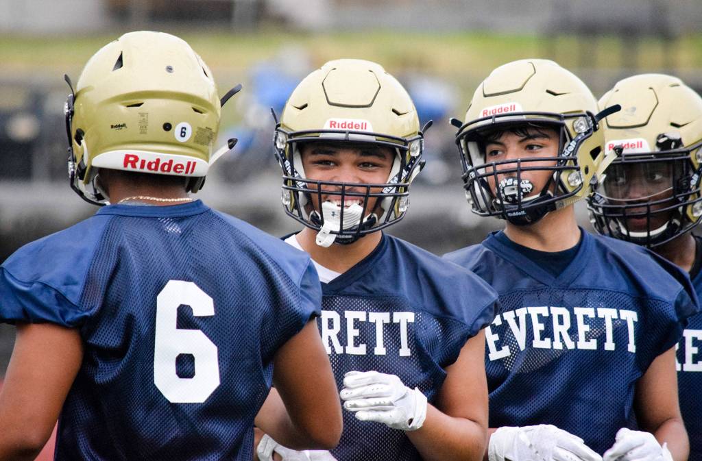 Everetts Maliquei Noland talks to his teammates during seven-on-seven drills at Everett Memorial Stadium on Wednesday, Aug. 21, 2019. (Katie Webber / The Herald)