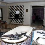 This October 2017 file photo released by the Las Vegas Metropolitan Police Department Force Investigation Team Report shows the interior of Las Vegas shooter Stephen Paddocks 32nd floor room of the Mandalay Bay hotel. The gunman who killed 58 people from his Las Vegas hotel room two years ago possessed a dozen 100-round magazines that helped him squeeze off 10 rounds per second onto a crowd of concert-goers. (Las Vegas Metropolitan Police Department via AP, File)