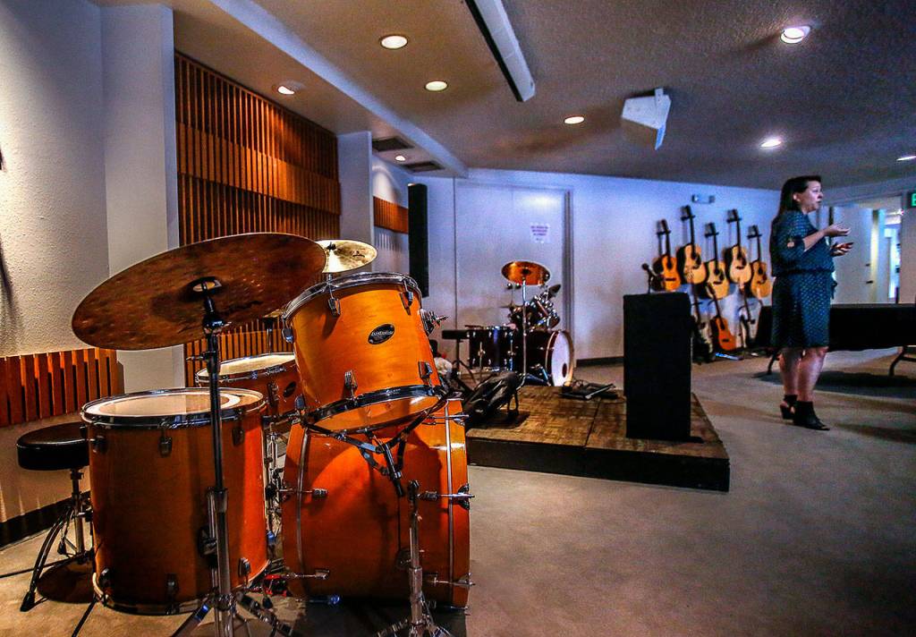 In the Snohomish County Music Projects new home, a former funeral home, the large room where memorial services were once held is now a venue for rock bands and music therapy. (Dan Bates / The Herald)