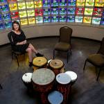 Vasheti Quiros, executive director of the Snohomish County Music Project, is more than pleased with the former Purdy & Walters with Cassidy Funeral Home facilities. The site on Everetts Pacific Avenue is the nonprofits new home. Here, she shows a small room, circled by stained glass, used for drum circles and meditative activities. (Dan Bates / The Herald)