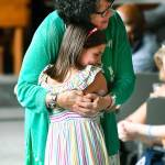 U.S. Supreme Court Justice Sonia Sotomayor hugs a child who is a fellow diabetic during an event Sunday in Decatur, Georgia, promoting her new childrens book Just Ask! about children with life challenges including diabetes. (AP Photo/John Amis)