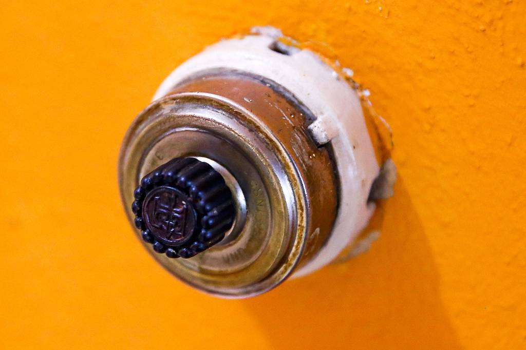 The Mausshardt home is filled with original details, like this vintage light switch. (Kevin Clark / The Herald)