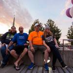 Breanne Miller (left), Troy Neilsen, Robert Smiley and Lindsey Arrington (right) listen to speakers during Snohomish Overdose Preventions A Night to Remember on Thursday in Everett. (Olivia Vanni / The Herald)