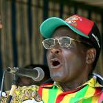 In this 2008 photo, Zimbabwe President Robert Mugabe addresses party supporters at a rally in Gweru. On Friday, Sept. 6, 2019, Zimbabwe President Emmerson Mnangagwa said his predecessor Robert Mugabe, age 95, has died. (AP Photo/Tsvangirayi Mukwazhi, file)