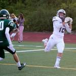 Glacier Peaks Brayden Corwin (right) hauls in a pass for a touchdown during a game against Edmonds-Woodway on Sept. 6, 2019, at Edmonds Stadium. (Andy Bronson / The Herald)