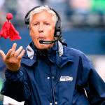 Seahawks head coach Pete Carroll throws the challenge flag at CenturyLink Field during Sundays game against the Cincinnati Bengals. (Kevin Clark / The Herald)