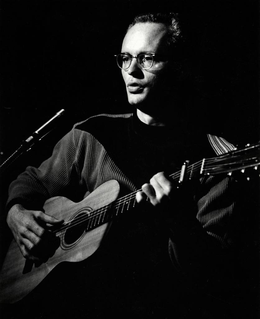 Folksinger Bob Nelson performs in Seattles University District in the late 1950s. (Courtesy Bob Nelson)