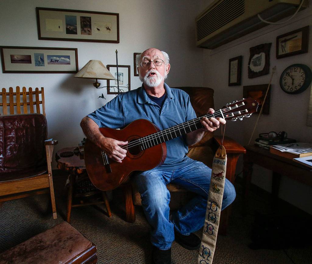 Just before going out to perform, Bob Nelson warms up in his living room at Sunrise View retirement community, where he lives with his wife, Judy. Soon, he and Bruce Baker will walk down the hall with Judy and another guest, Phil Flip Mansfield, and put on a wonderful musical treat for the residents. (Dan Bates / The Herald)