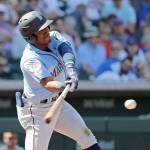 Seattles Kyle Lewis swings during a March 19 spring training game against the Chicago Cubs in Mesa, Arizona. (AP Photo/Elaine Thompson)
