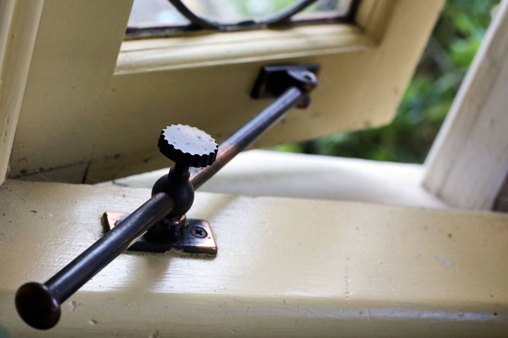 Original window hardware of The Hendrie house of 1902 in Snohomish and part of the upcoming historic homes tour. (Kevin Clark / The Herald)                                Original window hardware of the 1902 home.(Kevin Clark / The Herald)