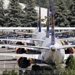 Grounded Boeing 737 Max airplanes, built for Icelandair, are parked in a lot normally used for cars in an area adjacent to Boeing Field in Seattle. (AP Photo/Elaine Thompson)