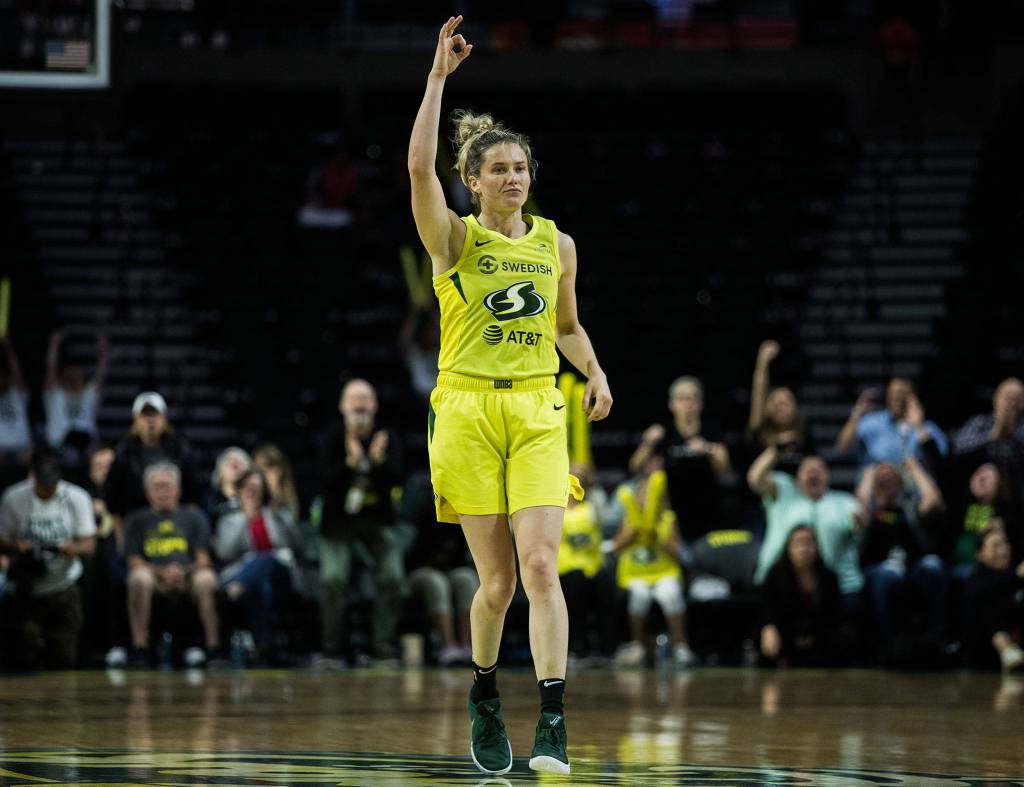 Seattle Storms Sami Whitcomb put up three finger after making a three point shot during the game against the Minnesota Lynx on Wednesday, Sept. 11, 2019 in Everett, Wash. (Olivia Vanni / The Herald)