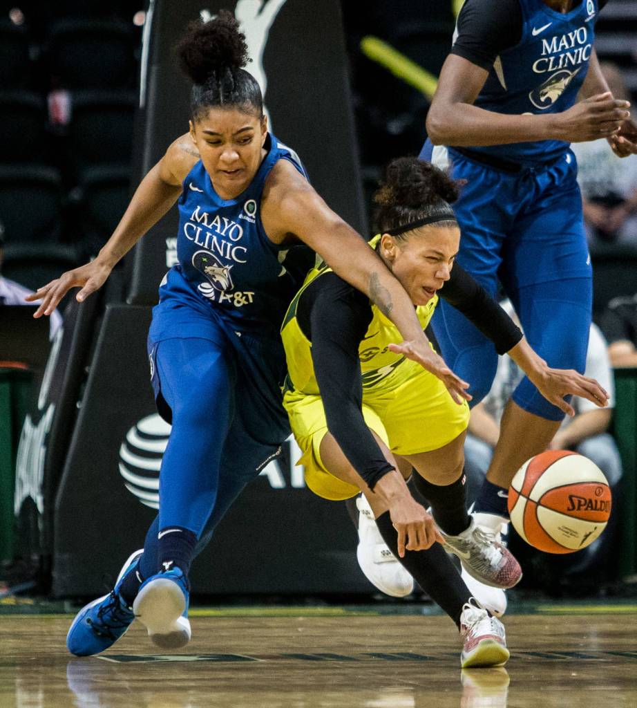 Seattle Storms Alysha Clark scrambles for the ball during the game against the Minnesota Lynx on Wednesday, Sept. 11, 2019 in Everett, Wash. (Olivia Vanni / The Herald)
