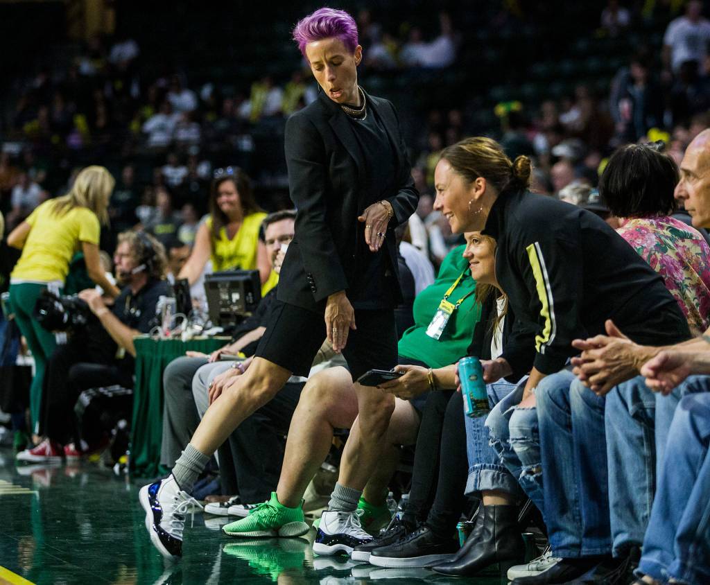 Megan Rapinoe shows of her shoes during the game against the Minnesota Lynx on Wednesday, Sept. 11, 2019 in Everett, Wash. (Olivia Vanni / The Herald)