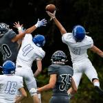 Shorewoods Spencer Osborn (3) blocks a pass to Meadowdales Colton Walsh (left) during a game on Sept. 13, 2019, at Edmonds Stadium. (Olivia Vanni / The Herald)