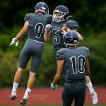 Meadowdales Kristian Lunsford (5) celebrates after his touchdown during a game against Shorewood on Sept. 13, 2019, at Edmonds Stadium. (Olivia Vanni / The Herald)