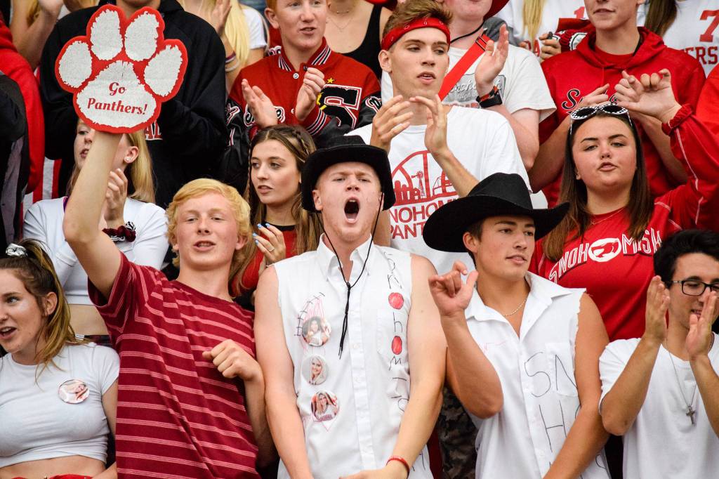 Snohomish High School students cheer before the game against Glacier Peak on Friday, Sept. 13 at Veterans Memorial Stadium. (Katie Webber / The Herald)