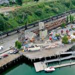 The Grand Avenue Park Bridge is swinging into place