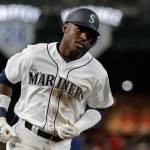 The Mariners Kyle Lewis (30) rounds the bases after hitting a solo home run during the fifth inning of a game against the Reds on Sept. 10, 2019, in Seattle. (AP Photo/Ted S. Warren)