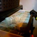 This photo shows money found in Aaron Shamos home. (U.S. Attorneys Office, Utah, via AP)