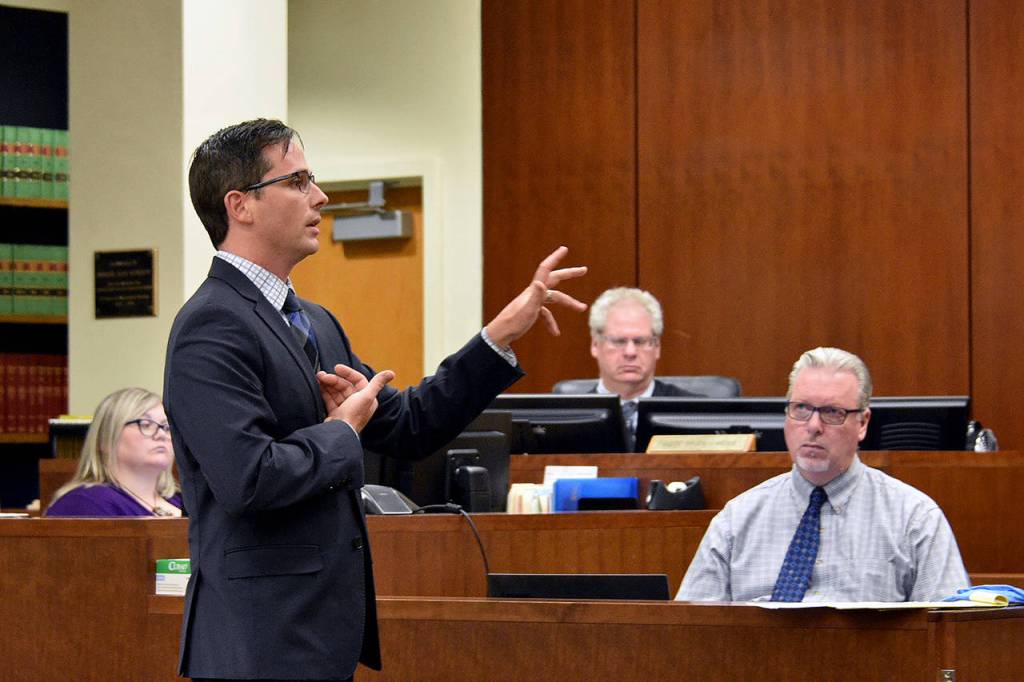Snohomish County deputy prosecutor Robert Grant gestures during closing arguments in the retrial of Encarnacion Salas on Sept. 16 in Everett. (Caleb Hutton / The Herald)