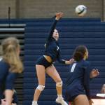 Arlingtons Arianna Bilby spikes the ball during a match against Shorecrest on Sept. 17, 2019, in Arlington. (Andy Bronson / The Herald)