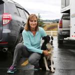 Carole King holds her border collie, Katie, who went missing for 57 days before she was located in a Kalispell, Montana neighborhood. (Mackenzie Reiss/Daily Inter Lake via AP)