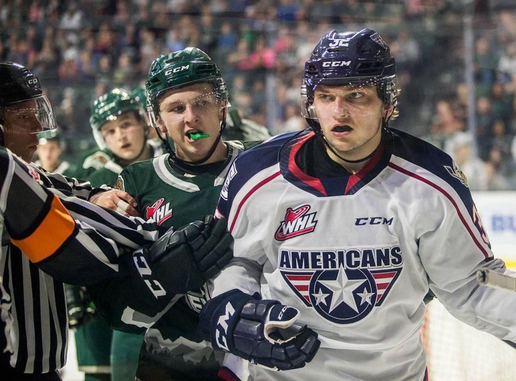 Referees breakup a fight between Silvertips Jackson Berezowski and Tri-Citys Nikita Krivokrasov during the game against the Tr-City Americans on Friday, Sept. 20, 2019 in Everett, Wash. (Olivia Vanni / The Herald)