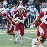 Junior running back Michael Purl runs with the ball against Mount Vernon on Friday, Sept. 20 at Everett Memorial Stadium. (Katie Webber / The Herald)