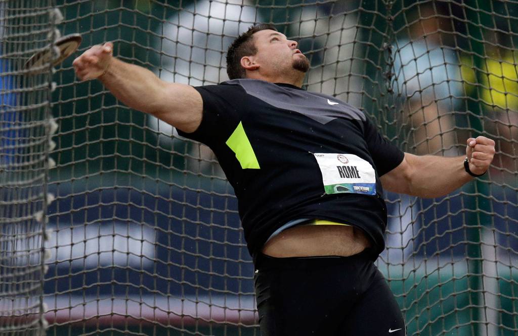Jarred Rome competes in the mens discus final at the U.S. Olympic Track and Field Trials on June 28, 2012, in Eugene, Ore. Rome finished second. (AP Photo/Charlie Riedel)