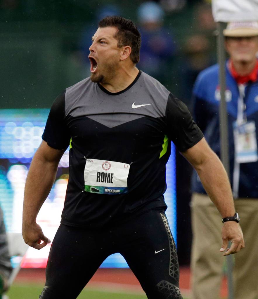 Jarred Rome celebrates his second-place finish in the mens discus final at the U.S. Olympic Track and Field Trials on June 28, 2012, in Eugene, Ore. (AP Photo/Charlie Riedel)