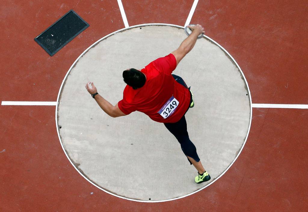 United States Jarred Rome competes in the mens discus qualification during athletics competitions at the 2012 Summer Olympics at the Olympic Stadium in London on Aug. 6, 2012. (AP Photo/Pawel Kopczynski, Pool)