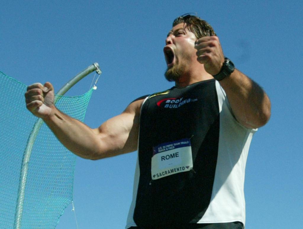 Jarred Rome yells after throwing the discus in the final during the Olympic Track and Field trials in Sacramento, Calif., on July 18, 2004. He placed first. (AP Photo/Eric Risberg)