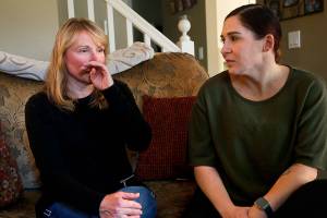 Bothells Susan Zahler, 59, and her daughter Alicia Lochrie, 33, (right) survived the Las Vegas shooting rampage that killed 58 people at a country-music festival on Oct. 1, 2017. The women have struggled with the aftereffects of what they saw, heard and survived. (Dan Bates / The Herald)