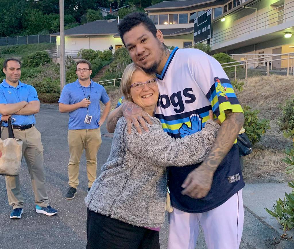 Kathy Chapman reconnects with Felix Hernandez following his rehab start in Everett in August. (Courtesy of Kathy Chapman)