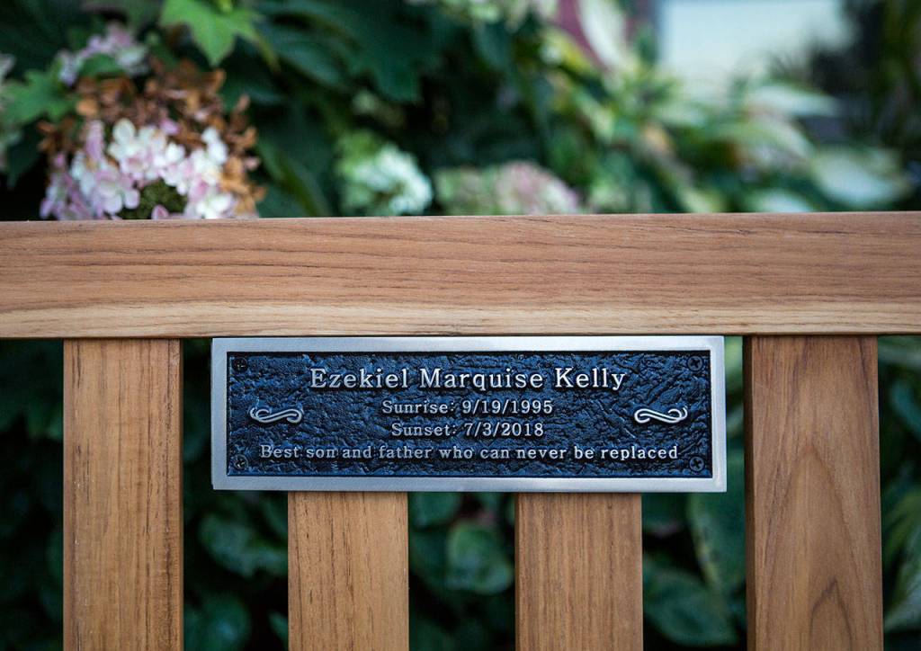 A small plaque with Ezekiels name is mounted on the back of the bench at the Rosehill Community Center on Saturday, Sept. 28, 2019 in Mukilteo, Wash. (Olivia Vanni / The Herald)