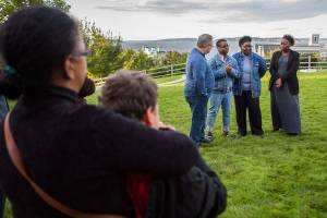 Ezekiel Kellys family Ann Fields, right, Pam Fields, and LaTonage Kelly speak to a group of family, friends and officials involved in his murder case at a bench dedication at the Rosehill Community Center on Saturday, Sept. 28, 2019 in Mukilteo, Wash. (Olivia Vanni / The Herald)