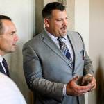 Jarred Rome talks with attendees during the 10th Annual Snohomish County Sports Hall of Fame Banquet at Angel of the Winds Arena in Everett on Sept. 18. (Kevin Clark / The Herald)