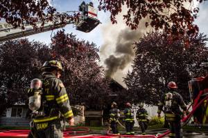 Firefighters battle 2-story house fire near downtown Everett