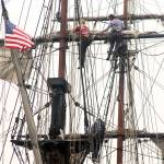 Deckhands prepare the sails on Lady Washington historic tall ship in Langleys harbor. (Wendy Leigh / South Whidbey Record)