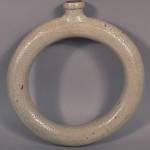 Sometimes the simplest idea is the best. This 19th-century flask held water for the farmer working in fields far from a stream. It sold at a Hess auction for $325. (Cowles Syndicate Inc.)