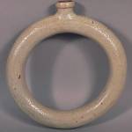 Cowles Syndicate Inc.                                Sometimes the simplest idea is the best. This 19th-century flask held water for the farmer working in fields far from a stream. It sold at a Hess auction for $325.