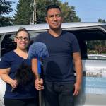 Janice Podsada / The Herald                                 Silver Hernandez, owner of Angels Cleaning Service in Lynnwood, and her husband, Cesar Lopez, take a break from cleaning.