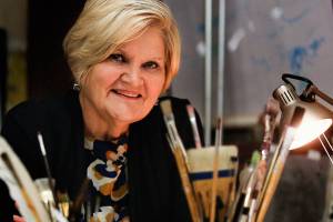 Norwegian born artist Inger Hutton became a U.S. Citizen last month after living about three decades in Everett. She decided it was time she became a voter. (Dan Bates / The Herald)