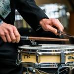David Constantine, a snare drum player for the U.S. Marine Band, performs for an Everett High School band class on Friday. (Olivia Vanni / The Herald)
