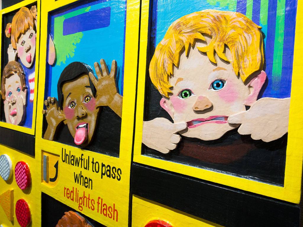 Artist Jerry Steffen Jr. Steffens prize-winning piece, Kids Silly Face, was inspired by the backseat antics of Mountlake Terrace children in the school bus in front of his car. (Andy Bronson / The Herald)