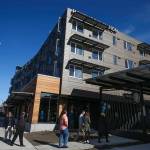 Hundreds of people gathered at HopeWorks Station for an opening ceremony Friday. (Andy Bronson / The Herald)