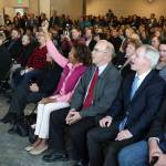 Lynnwood City Council member Shirley Sutton cheers along with hundreds of people gathered at HopeWorks Station for an opening ceremony Friday. (Andy Bronson / The Herald)